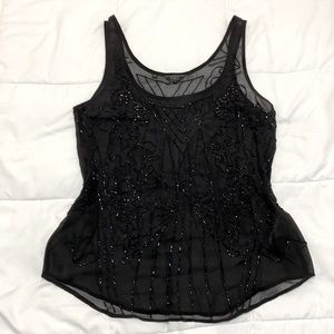 Guess see-through sequined black top.